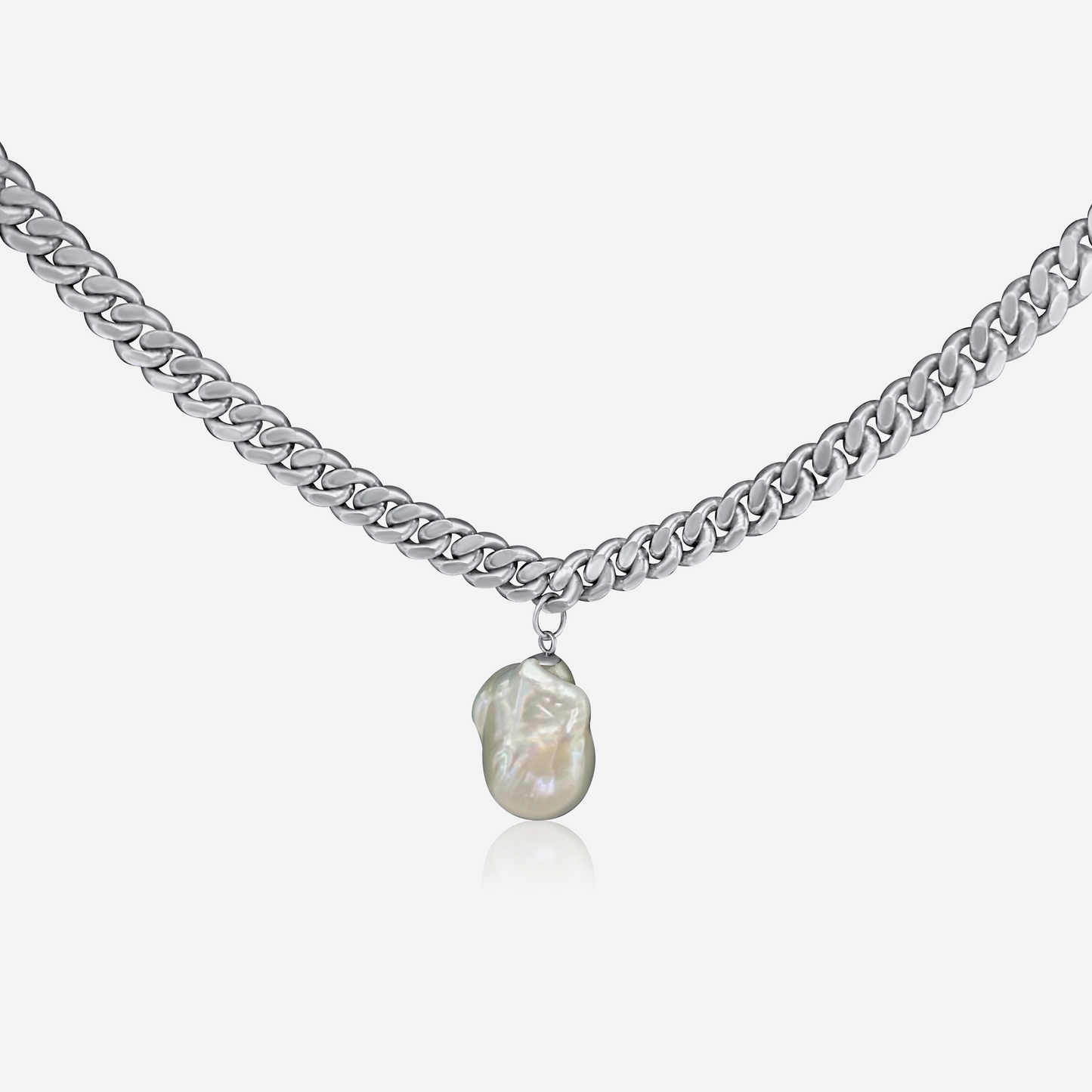 A silver-colored chunky chain necklace with a single large freshwater pearl pendant.