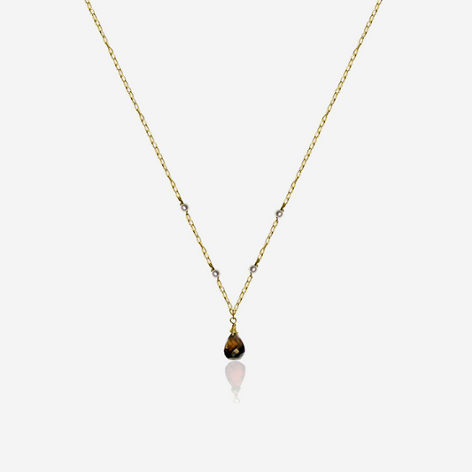 A Smoky Quartz with Tiny Akoya Pearl Necklace on a gold-tone chain with a single smoky quartz pendant and small pearls along the length.