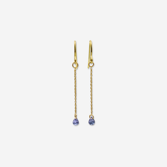 A pair of tanzanite drop earrings with gold settings and chain links, displaying the earrings hanging vertically.