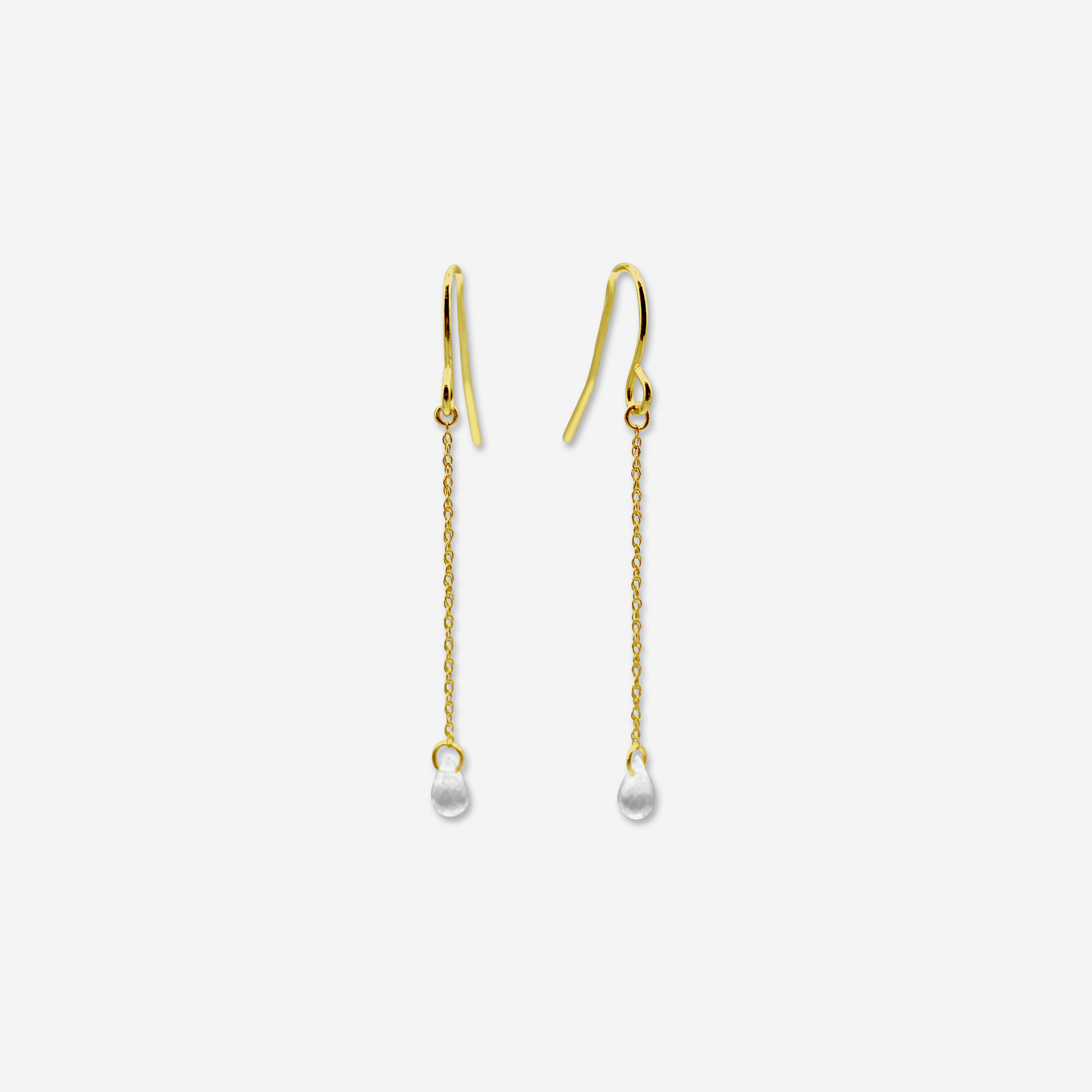 A pair of rose quartz drop earrings with 14-karat yellow gold chains, isolated on a white background.