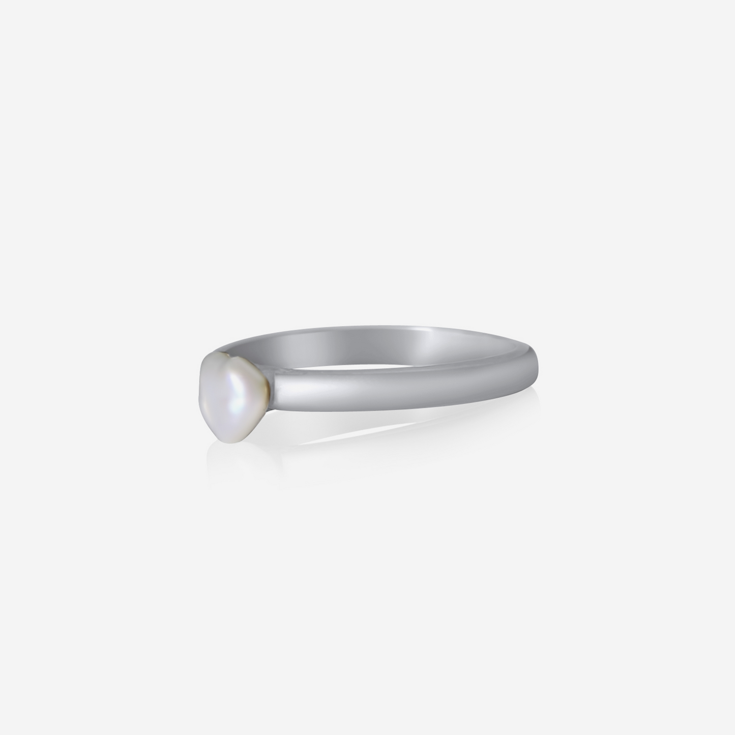 A Keshi pearl ring with a gold band, showcasing a unique and organic shape.