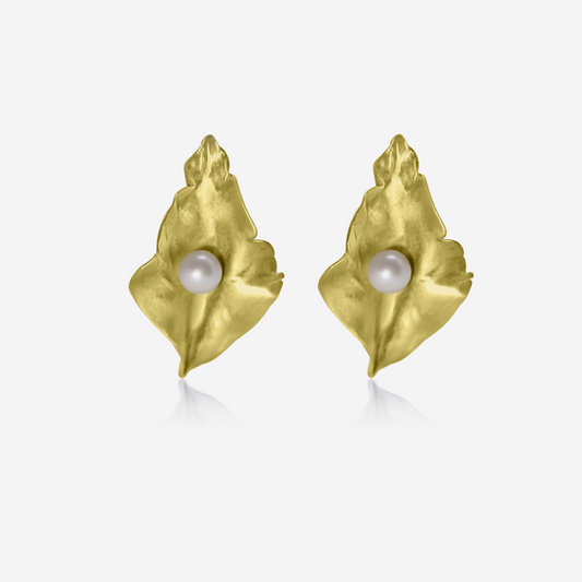 A pair of gold petal-shaped earrings with Akoya pearls at their center, displayed against a white background.