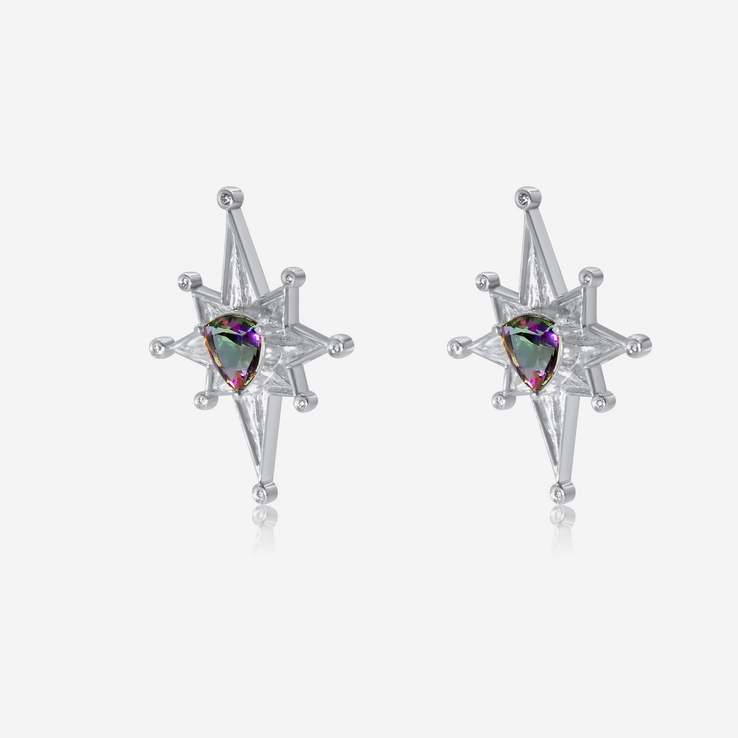 A pair of gold-colored earrings with star-shaped designs and purple Mystic Tourmaline at the center.