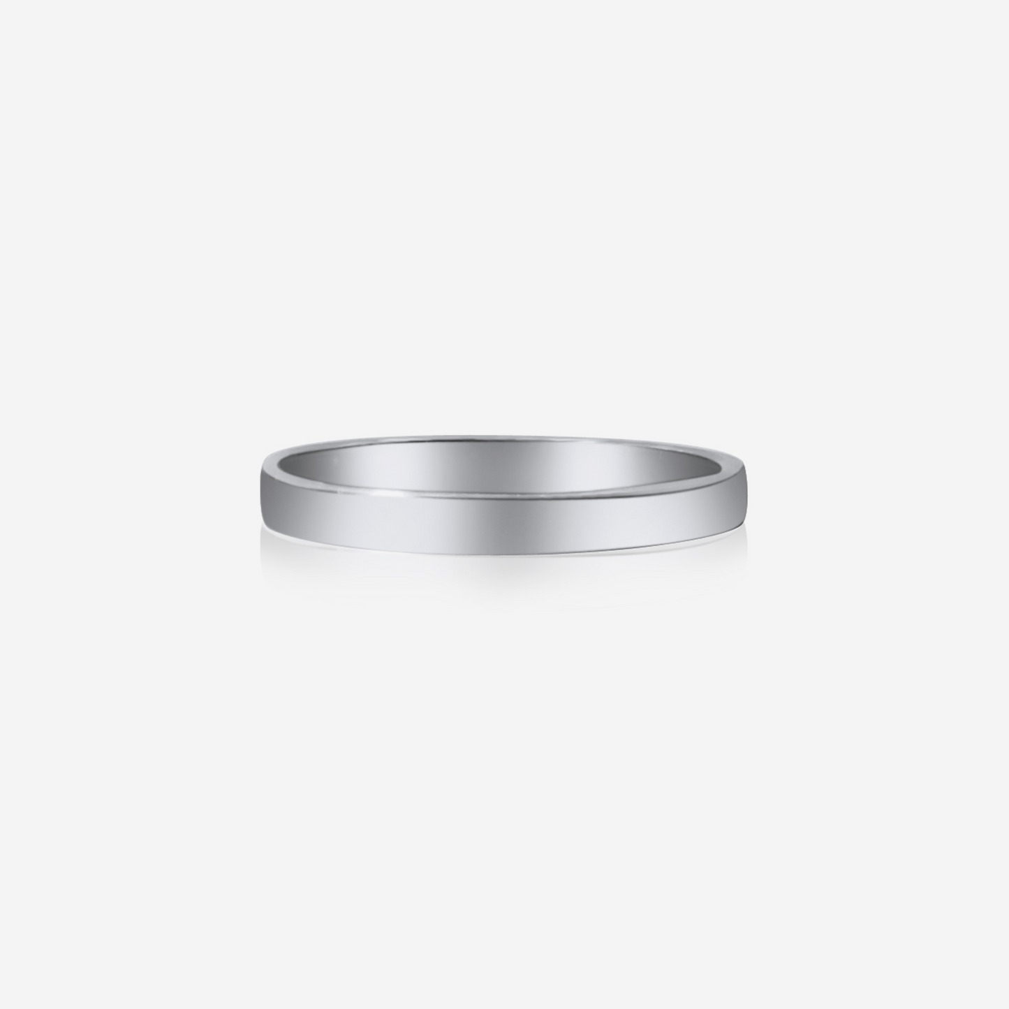 A simple, elegant gold wedding band with a shiny finish.
