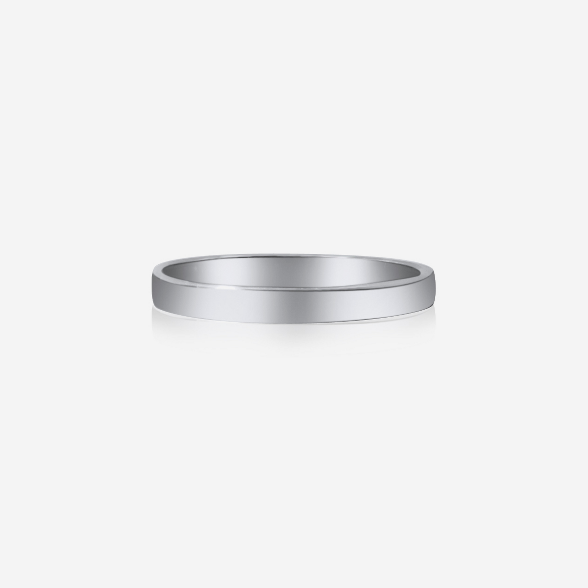 A simple, elegant gold wedding band with a shiny finish.