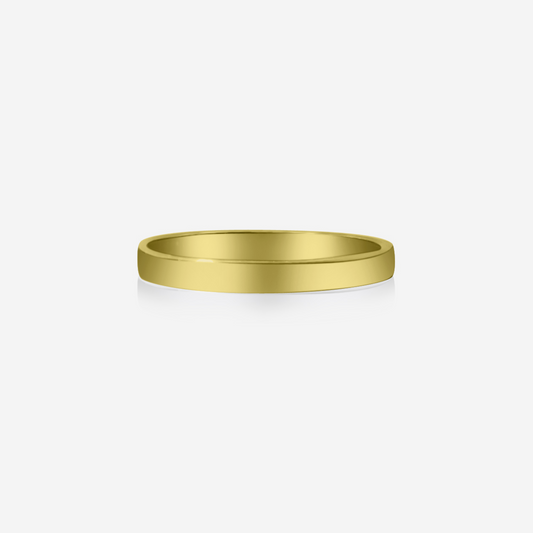 A simple, elegant gold wedding band with a shiny finish.