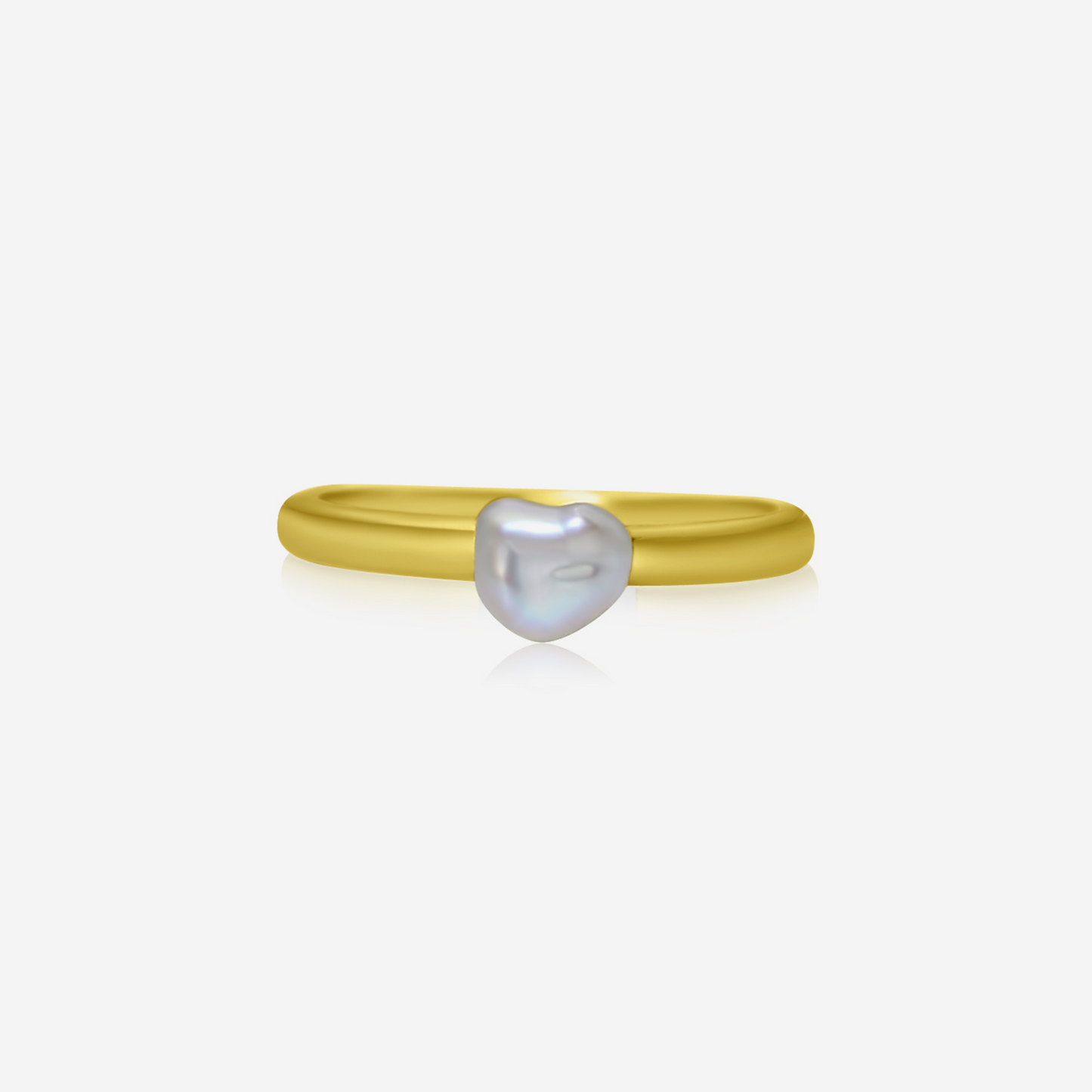 A Keshi pearl ring with a gold band, showcasing a unique and organic shape.