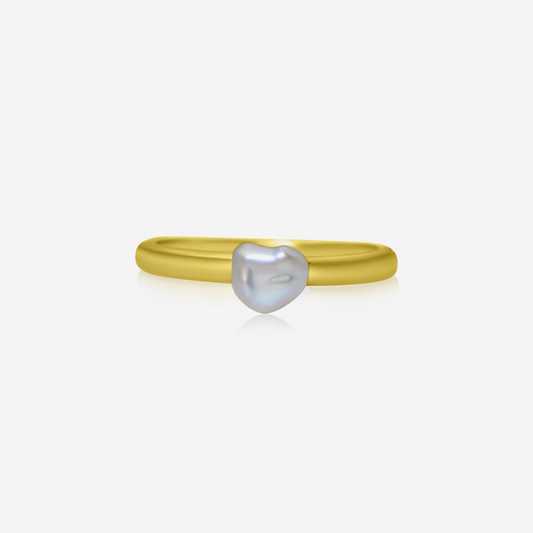 A Keshi pearl ring with a gold band, showcasing a unique and organic shape.