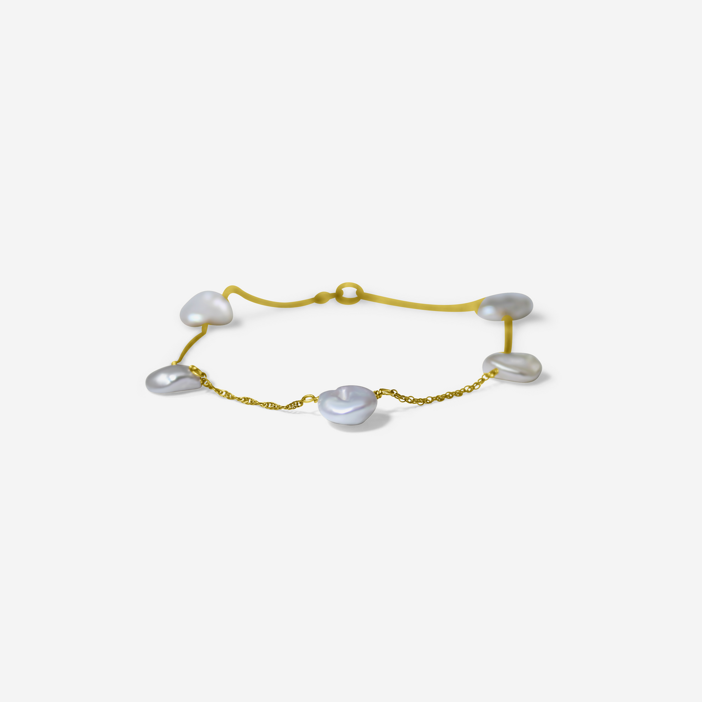 Gold bracelet with heart-shaped pearls on a light gray background