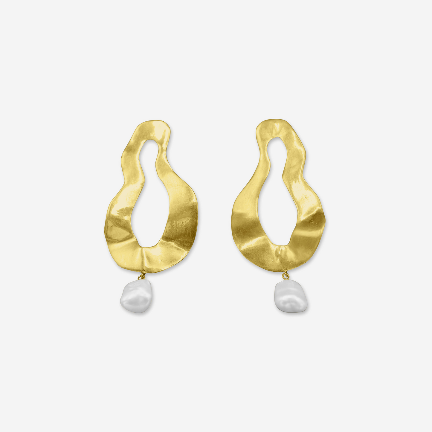 Gold earrings with pearl drops on a white background