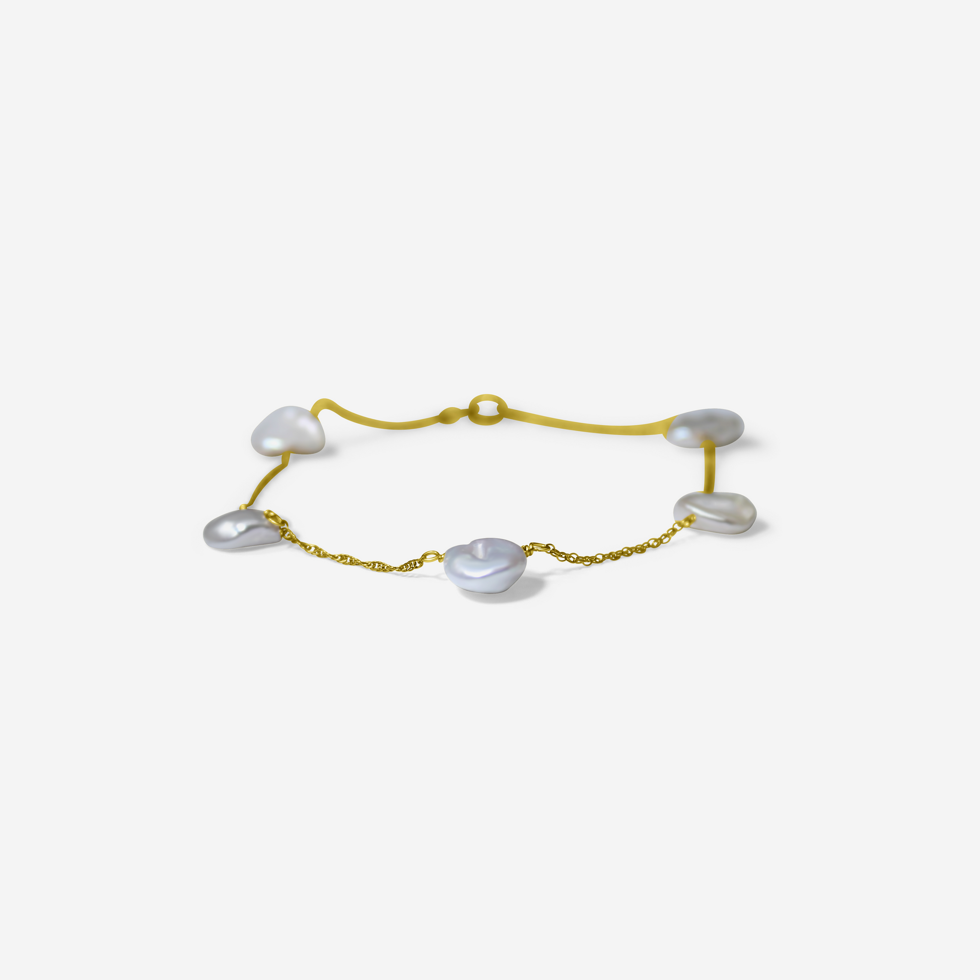 Gold bracelet with heart-shaped pearls on a light gray background