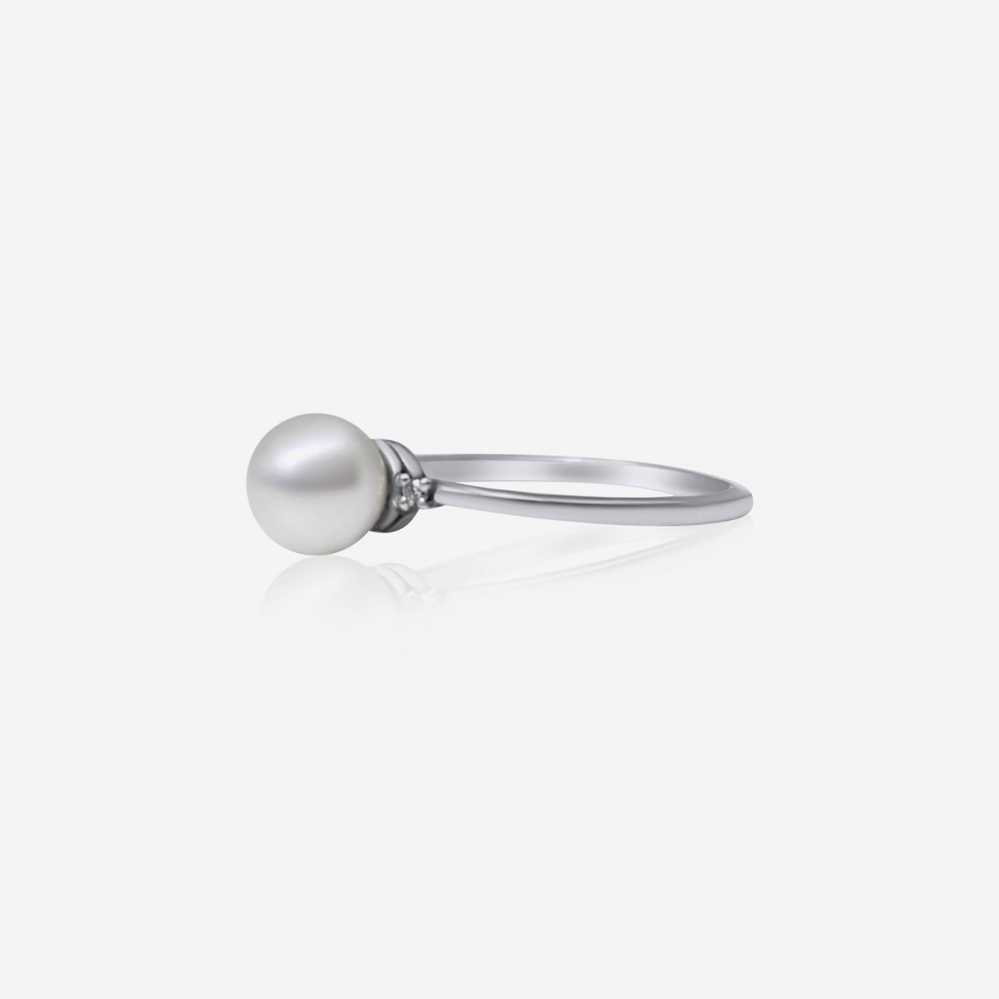 Akoya pearl and diamond engagement ring in 18K white gold – Made by Petit Jewelry